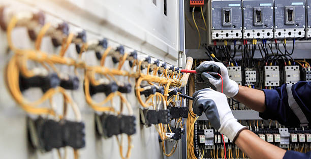 Professional Electrician technician working in Summerfield, NC